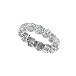 A silver eternity ring featuring a continuous circle of round-cut diamonds set against a white background.