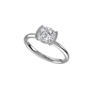 A silver ring featuring a single cushion cut diamond set in a polished band.
