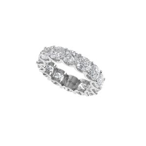 A platinum or white gold eternity ring featuring a continuous band of cushion cut stones against a plain white background.